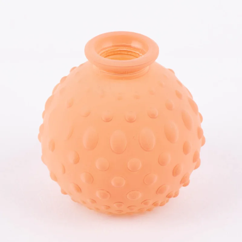 Preiswert Vase bauchig rund geprägt Glas matt pastell orange verschiedene Muster 8,5x8cm